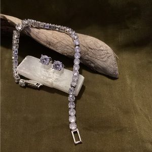 - Simulated Diamond Stud Earrings and Tennis Bracelet in Silvertone, 7in